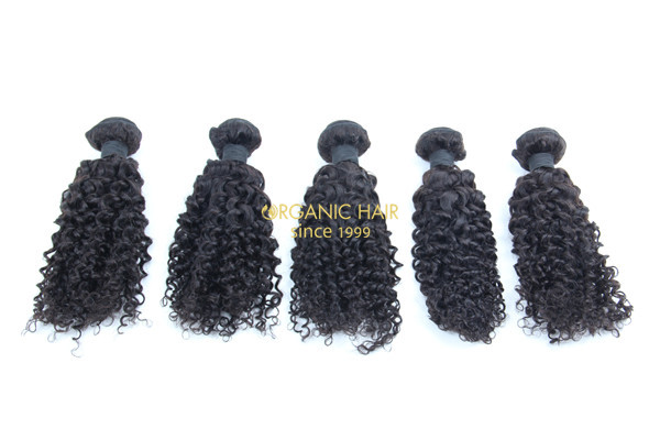 Curly black remy human hair weave 